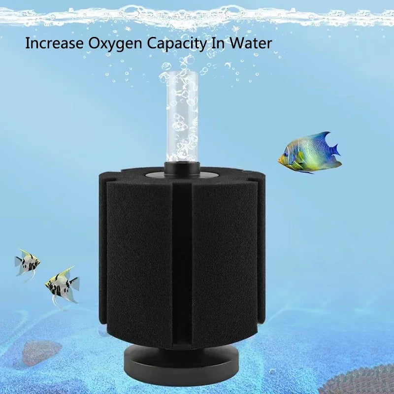 A black aquarium bio sponge filter with an air pump skimmer is shown in blue water with a fish nearby.