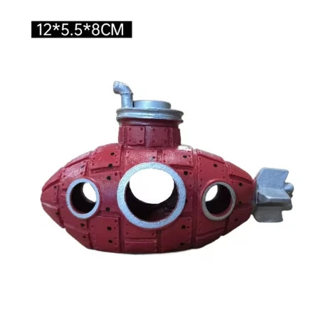A red resin submarine ornament with a silver snorkel visible on top.