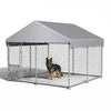 A galvanized wire dog kennel with a gray waterproof cover and a feeding door, shown from the side.