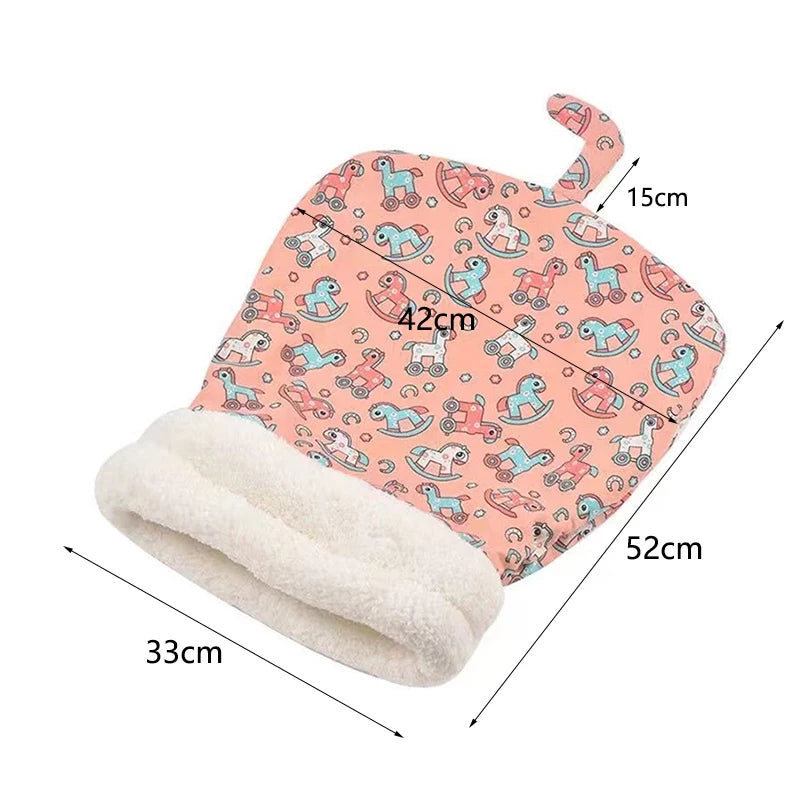 A cozy closed-design cat bed with a pink and orange floral pattern, featuring a soft white fleece lining.