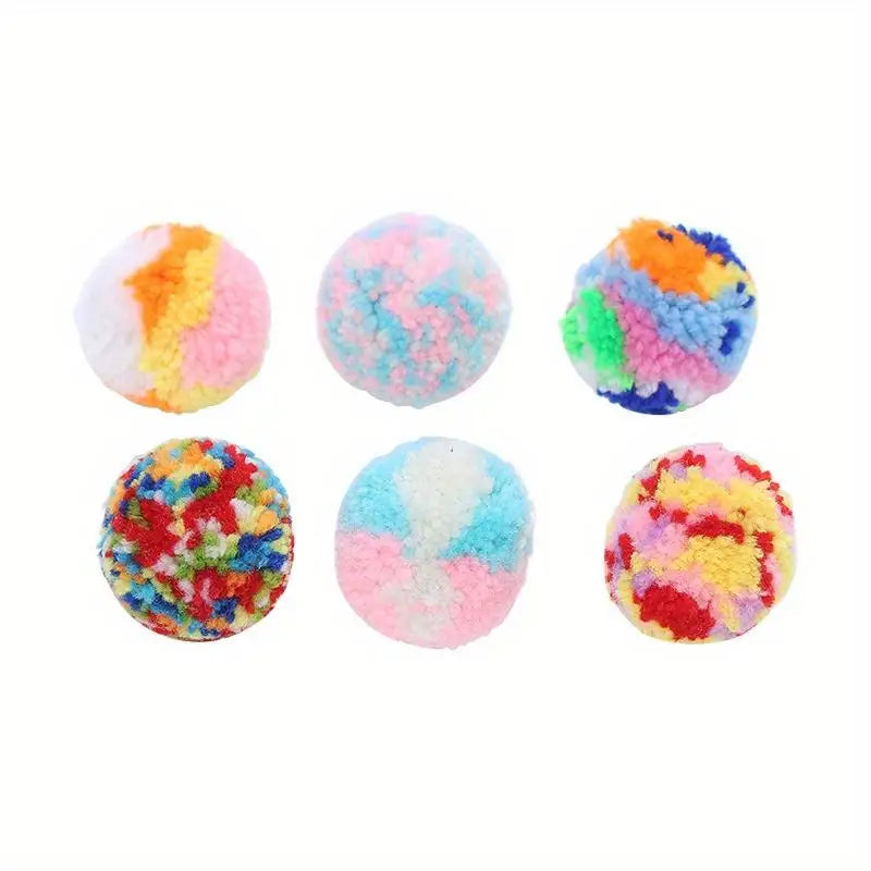 Six colorful plush wool balls in various shades of pink, blue, yellow, and orange for cat play