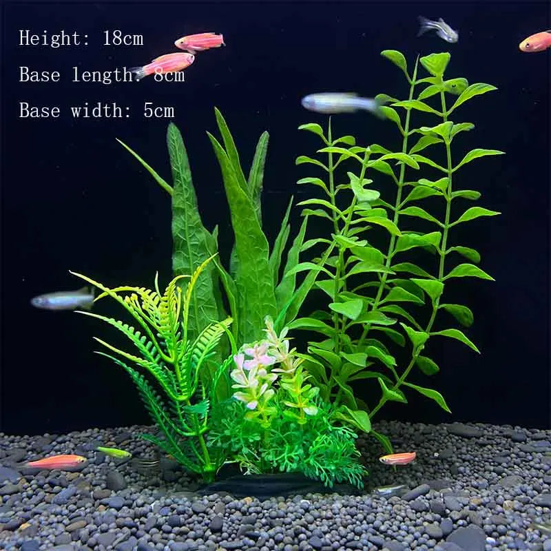 A realistic artificial aquarium plant setup featuring various green aquatic plants on a gravel substrate.