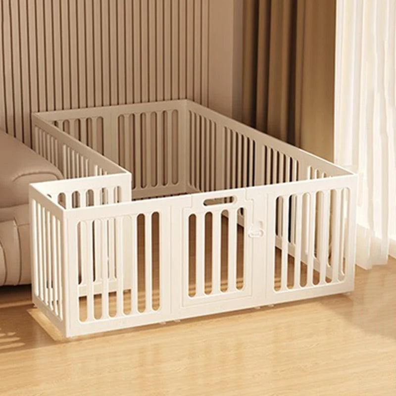 A white indoor pet playpen with a double suction cup mount is shown in a room setting.