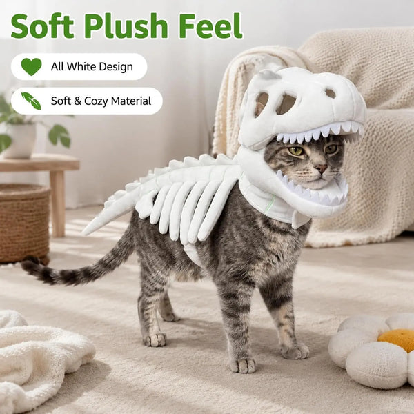 A gray tabby cat wearing a white dinosaur skeleton pet costume with a soft plush feel.