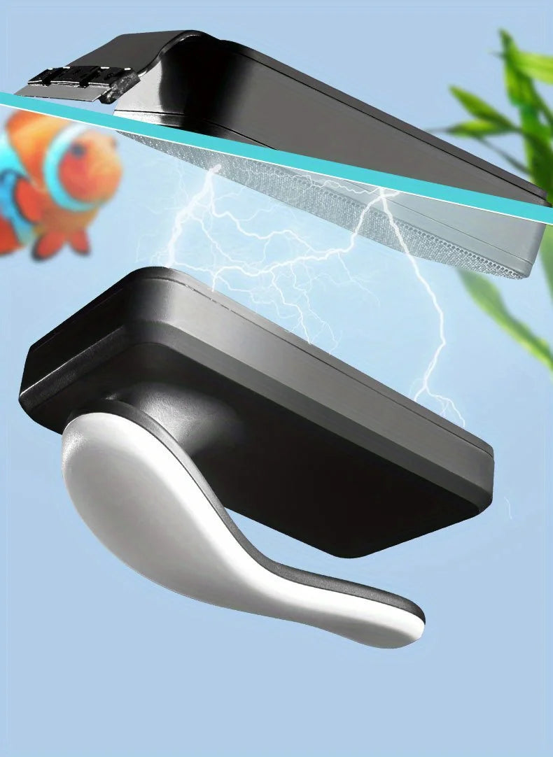 A black magnetic aquarium cleaning brush is shown with a blue lightning effect and a goldfish in the background.
