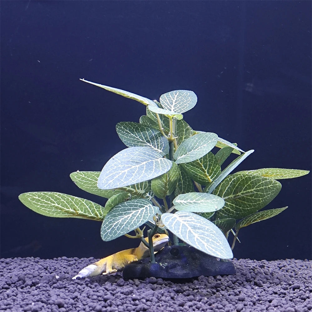 A realistic turtle tree trunk aquarium decoration with green leaves set against a dark background.