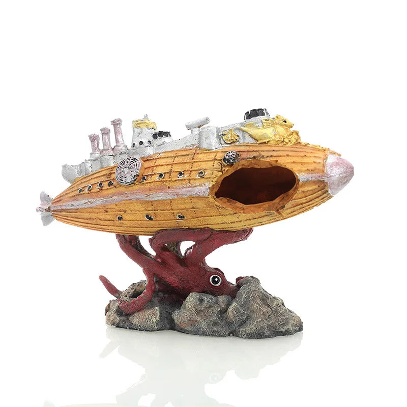 A model of a wooden submarine with gold accents and a hideout cave, mounted on a rock base.