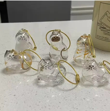 Set klare Glas-Haartaschen-Anhänger in Katzenform mit goldfarbener Schnur.