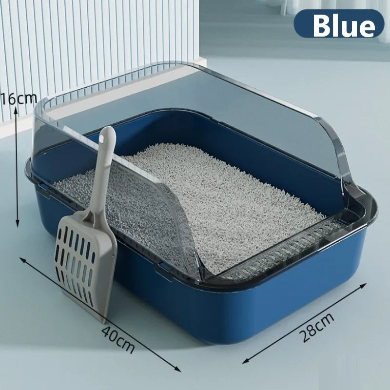 Blue semi-enclosed splashproof cat litter box with a scoop and white litter