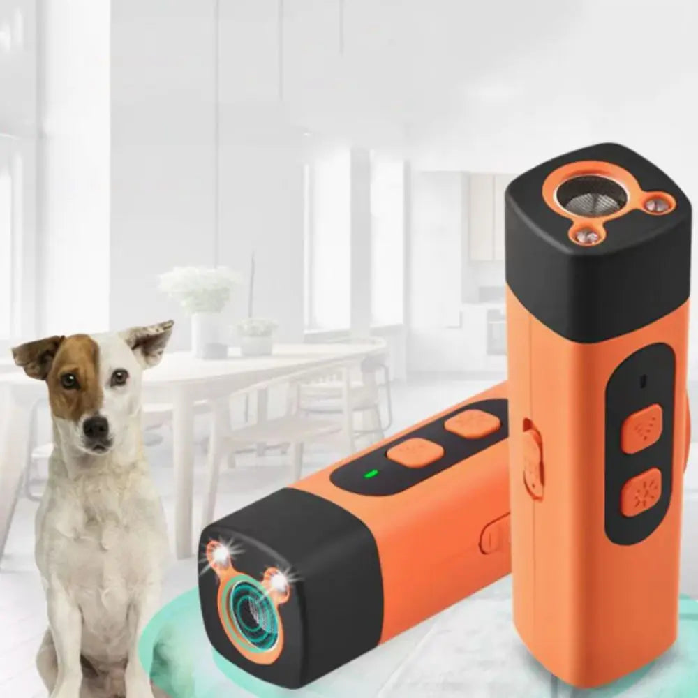 An orange and black rechargeable ultrasonic dog repeller with an LED flashlight is shown next to a dog.