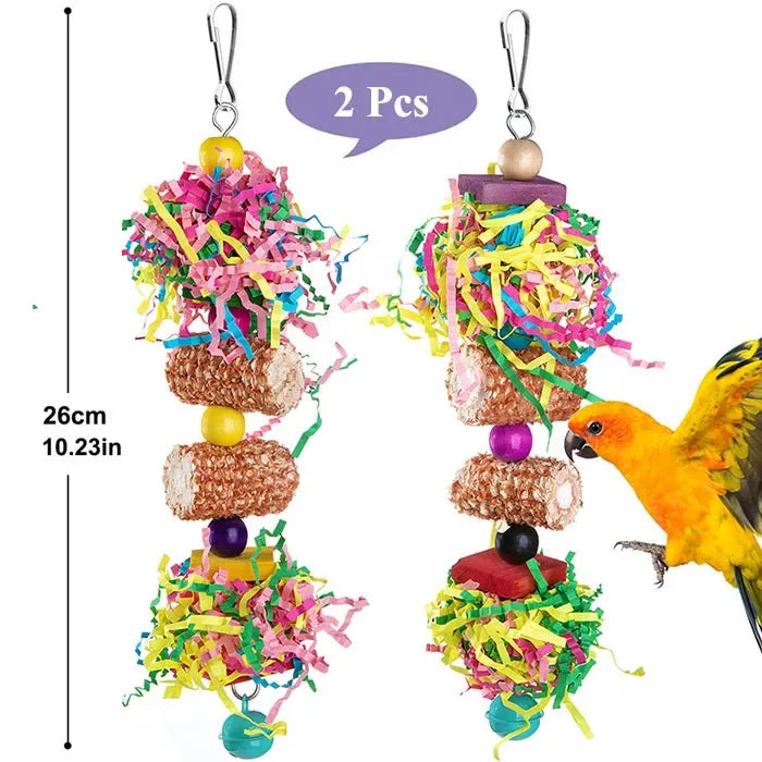 Two natural wooden parrot shredder toys with colorful shredded paper and wooden balls.