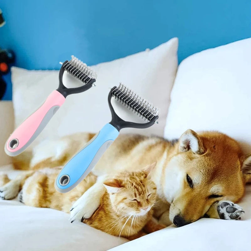 A golden retriever and a tabby cat are resting on a white pillow with two pink and blue stainless steel pet dematting combs.
