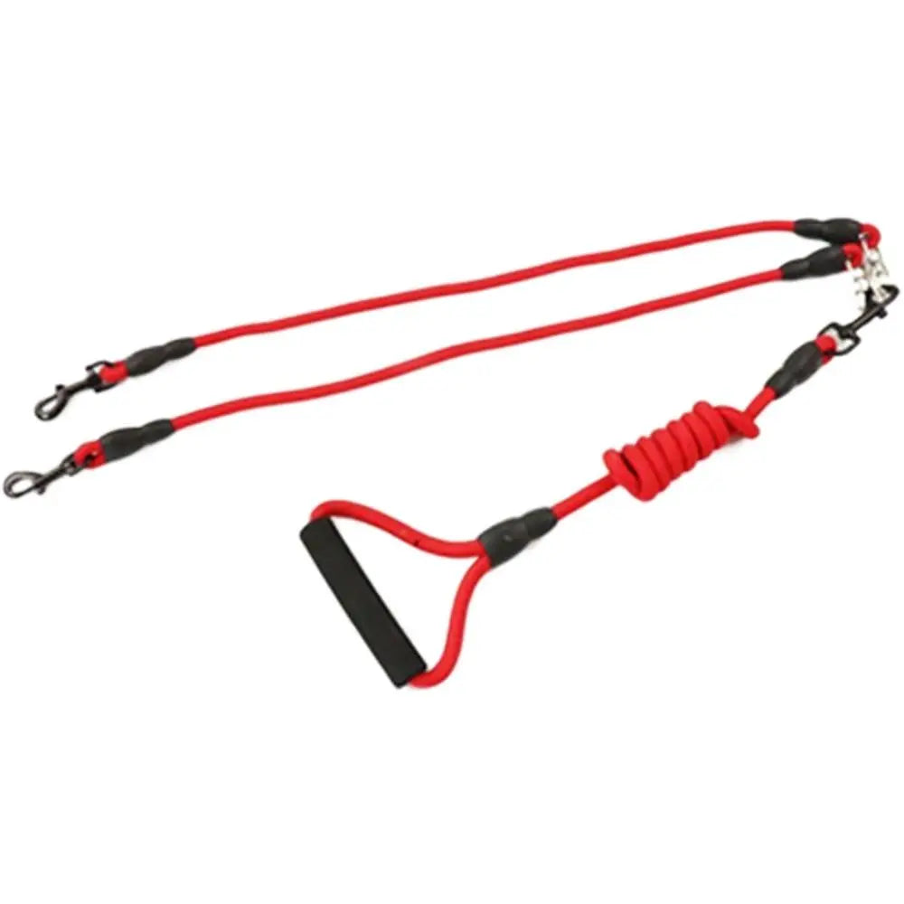 Red 2-way dual dog leash coupler used to connect and walk two dogs.