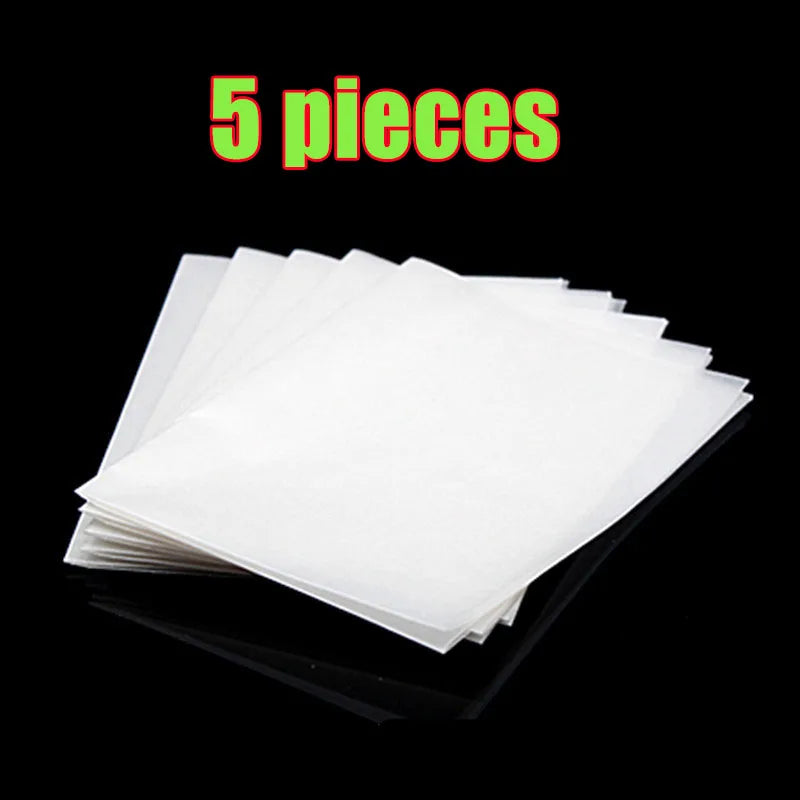 Five sheets of white precision hama beads are displayed on a black surface.