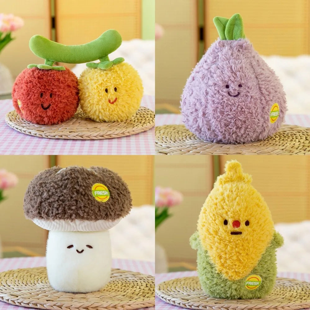 A collection of soft plush vegetable dolls including a purple squash, yellow squash, broccoli, and a mushroom on woven mats.