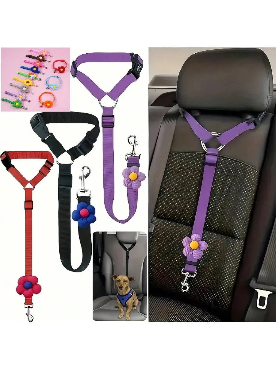 Purple and pink adjustable pet car seat belt with floral accents shown on a seat.