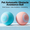 Two pet automatic obstacle avoidance balls, one blue and one pink, resting on a white surface.