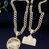 A pair of 14K gold plated last supper medallion necklaces featuring Cuban chains and detailed pendants.