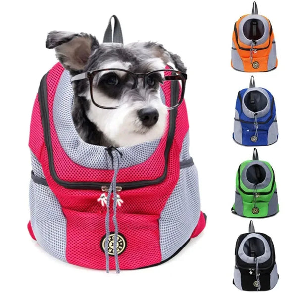 A gray and black dog wearing glasses is visible inside a pink and gray double shoulder carrier backpack with multiple straps.