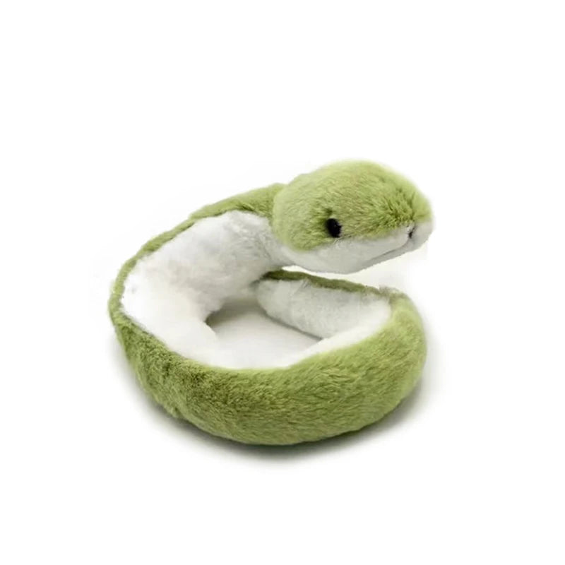 A cute green snake plush toy with white accents, shown in a close-up view.
