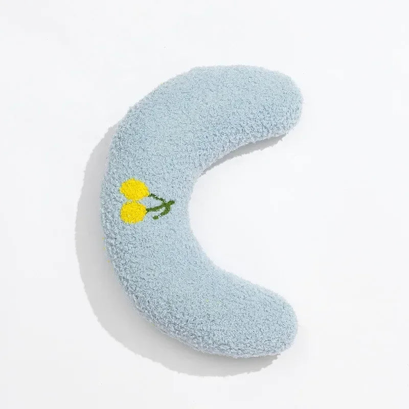 Light blue U-shaped cat sleeping pillow with yellow flower embroidery