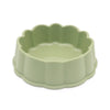 A light green non-slip pet feeding bowl with a fluted rim.