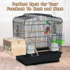 A black wire parakeet cage with a wooden viewing panel and accessories for a pet bird.