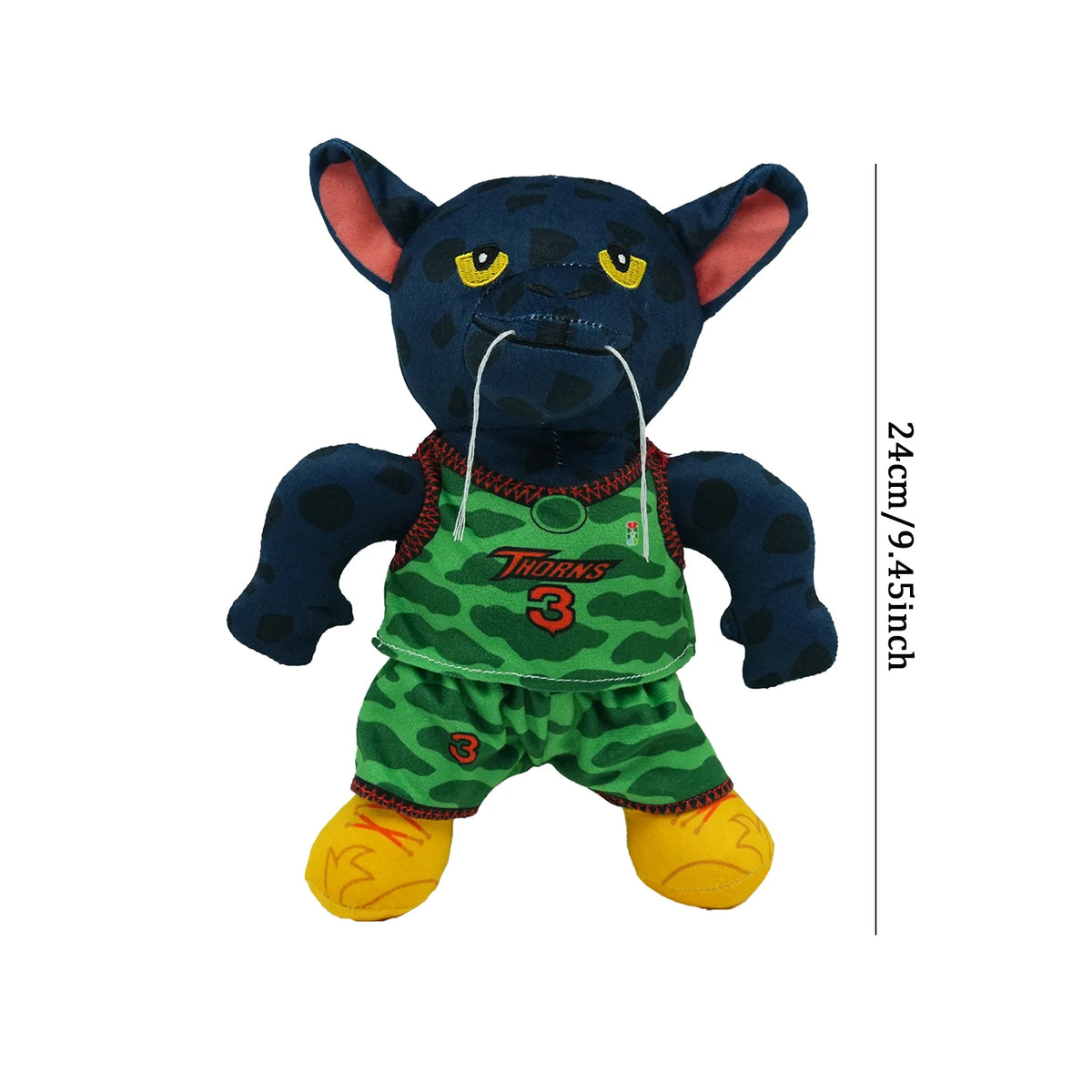 A dark blue cartoon goat plush toy with large ears and green clothing.