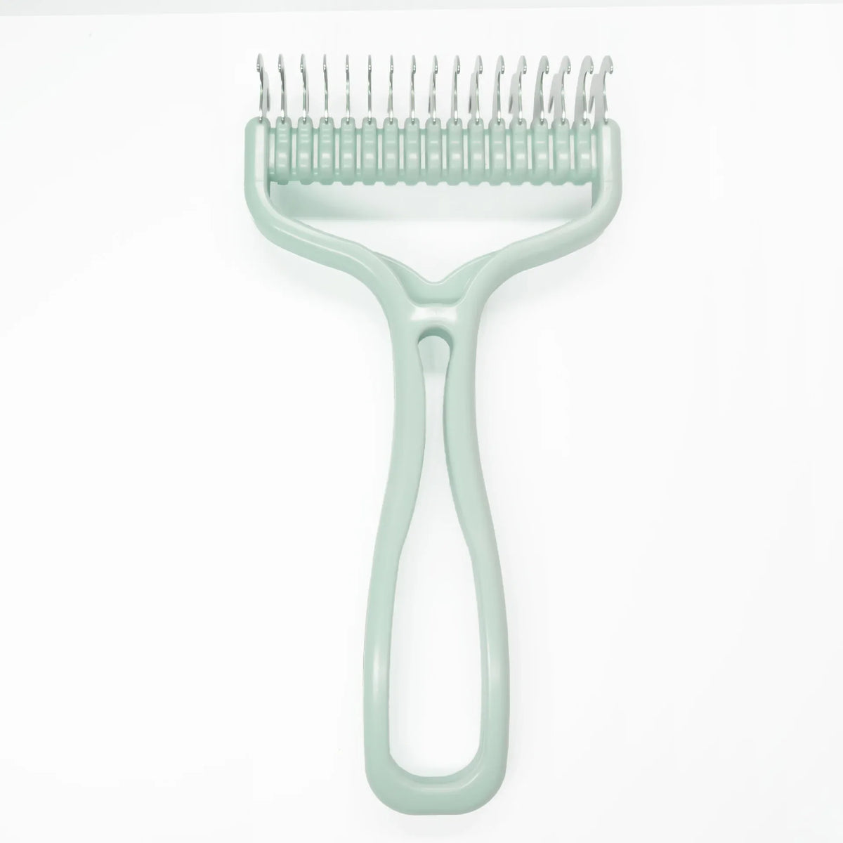 A light green 2-in-1 pet grooming brush with a knot remover tool.