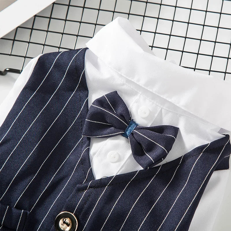 A navy blue striped tuxedo shirt with a bow tie displayed on a white collar against a black grid background.