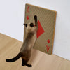 A vertical cat scratcher with a wall-mount design featuring red letters and shapes on a textured background.