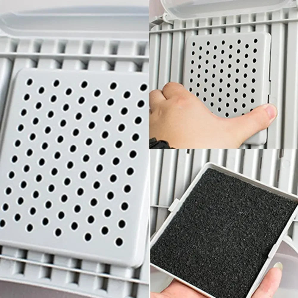 A close-up view of activated carbon litter box filter pads with perforated surfaces being placed into a plastic tray.
