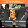 A golden retriever sits on a black car seat cover with side flaps for full protection.