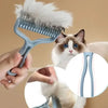 A hand holds a light blue pet hair removal comb being used on a cat's fur.