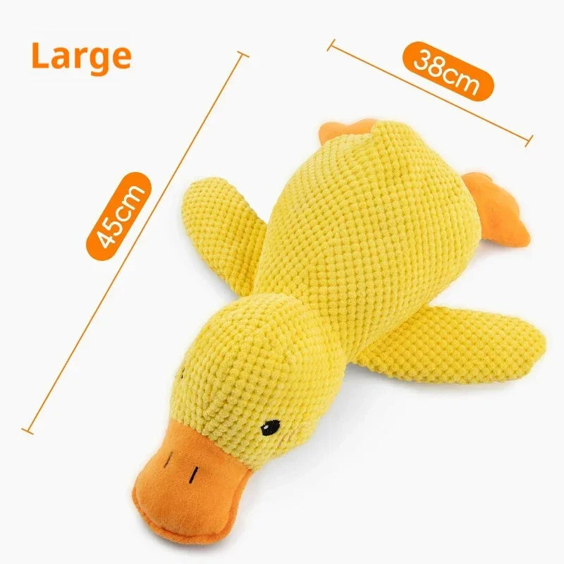 Large yellow plush duck toy for dogs with orange beak and feet