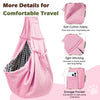 Pink reversible hands-free dog sling carrier with storage pocket and soft cotton fabric