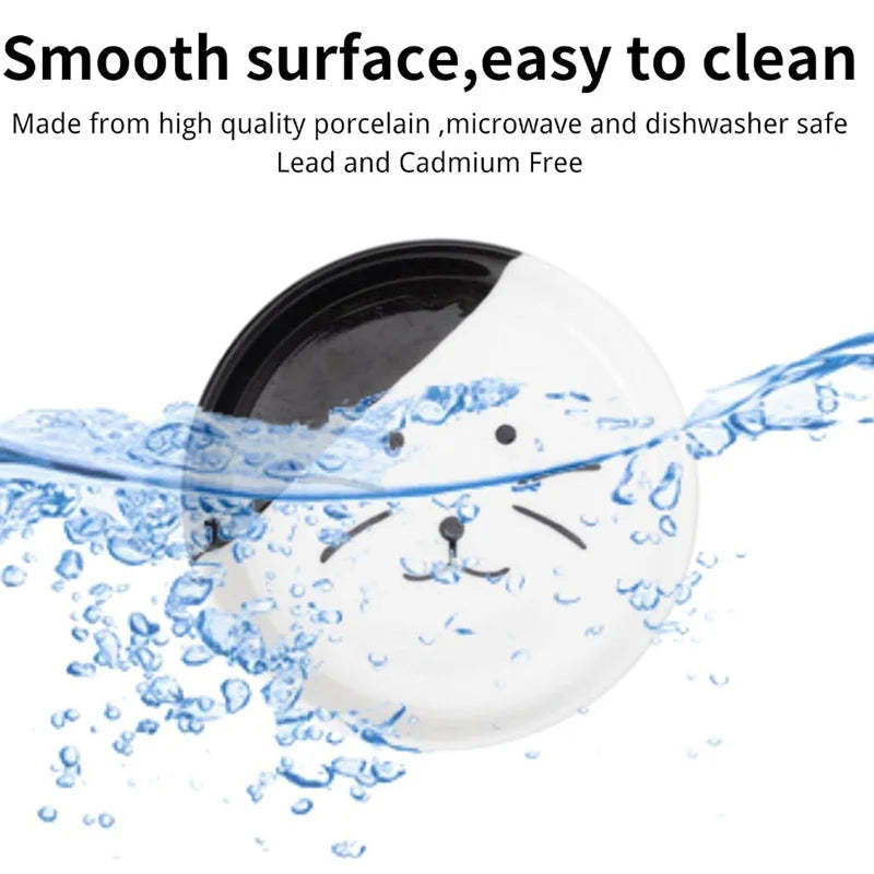 A white ceramic cat food dish is shown being washed with clear water droplets.