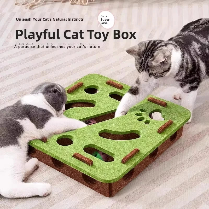 A playful cat toy box with felt puzzle elements and a cat playing inside.
