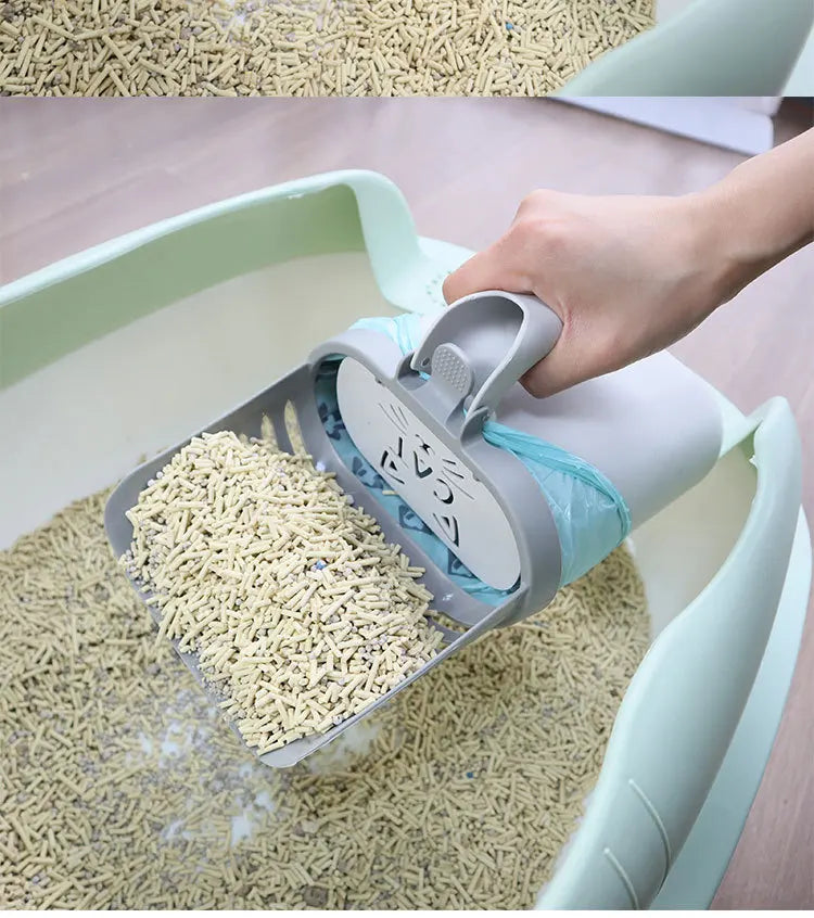 A hand is scooping cat litter from a bin using a self-cleaning scoop with refill bags.