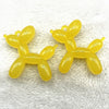 Two yellow acrylic balloon dog charm pendants for jewelry making and keychains