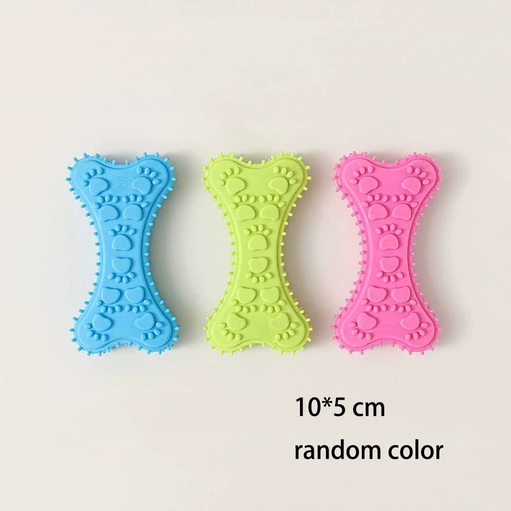 Three bone-shaped rubber chew toys in blue, green, and pink for small dogs