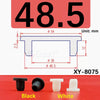 Black and white silicone rubber hole plugs shown next to a measurement scale.