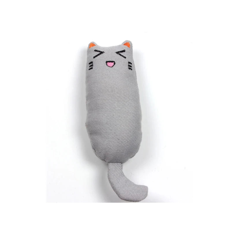 A gray plush cat toy shaped like a face with orange ears and a pink nose.