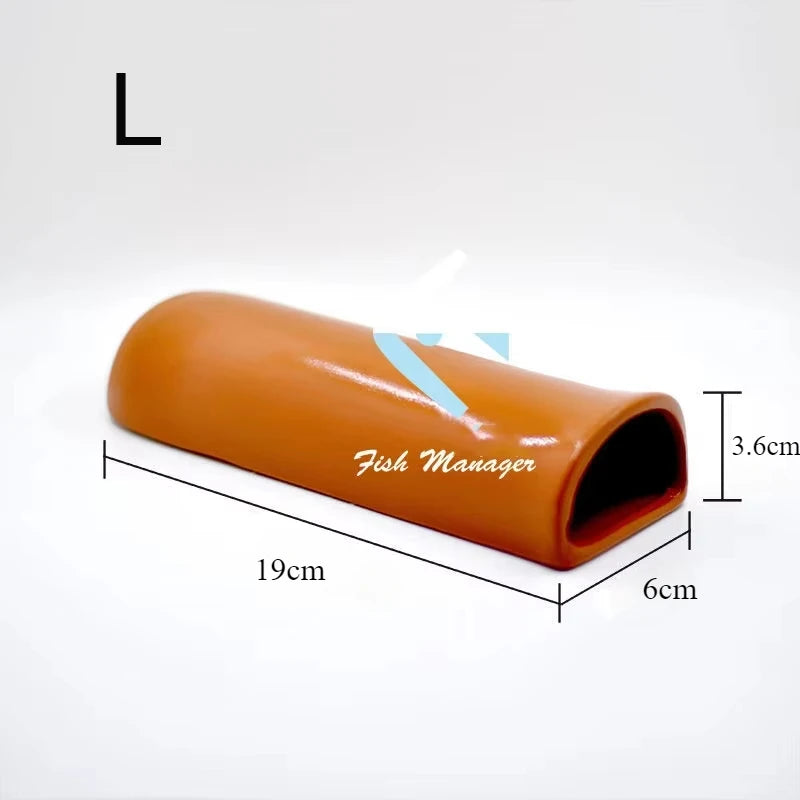 An orange ceramic fish manager tube shown in a side view with dimensions 19cm long and 6cm wide.
