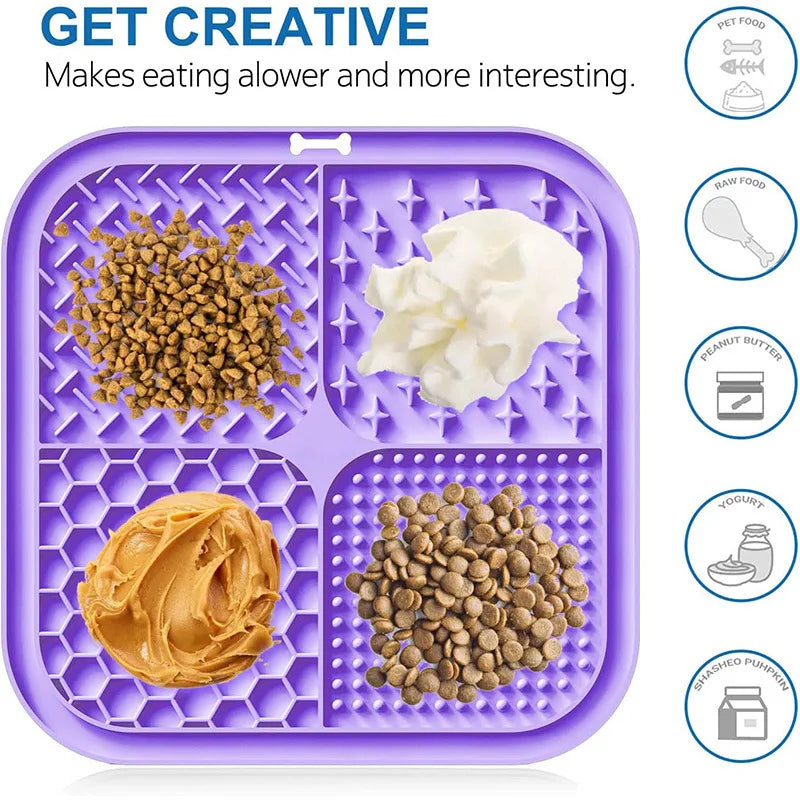 Purple silicone pet licking mat with hexagonal design holding dry food and wet food for slow feeding