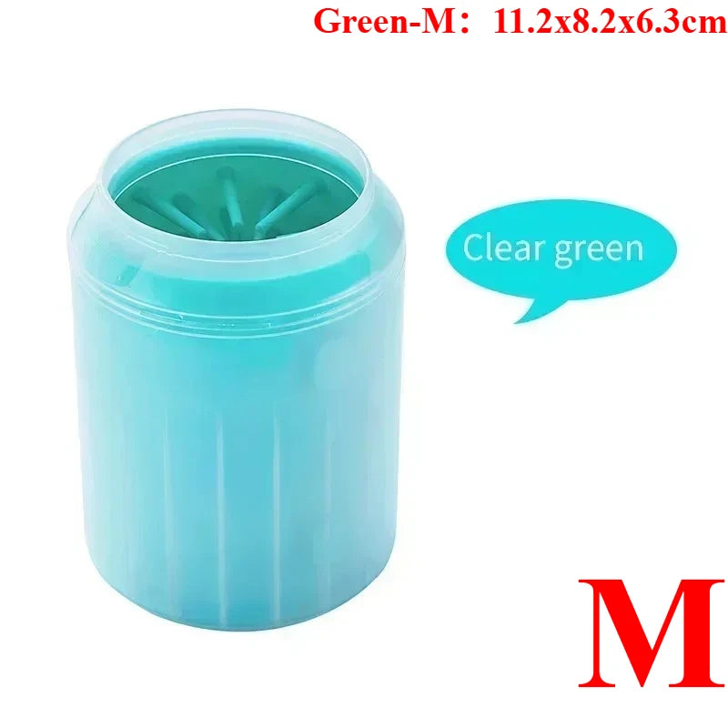 A clear green portable paw washer cup with soft silicone bristles.