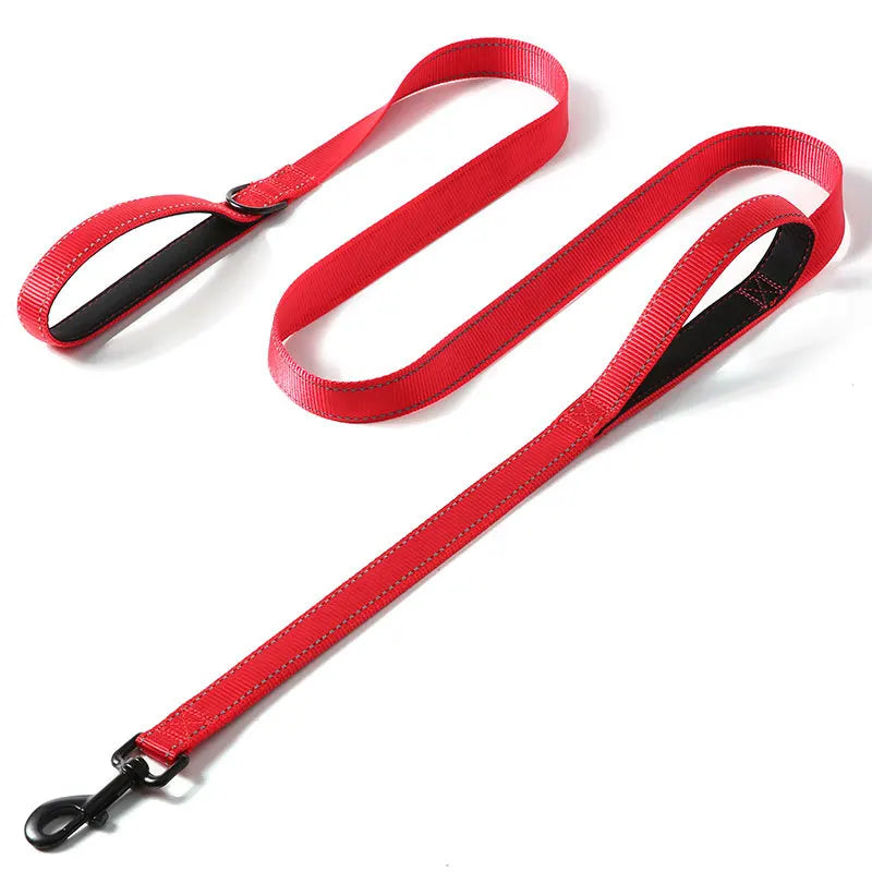 A red and black heavy duty reflective dog leash with dual handles shown against a white background.