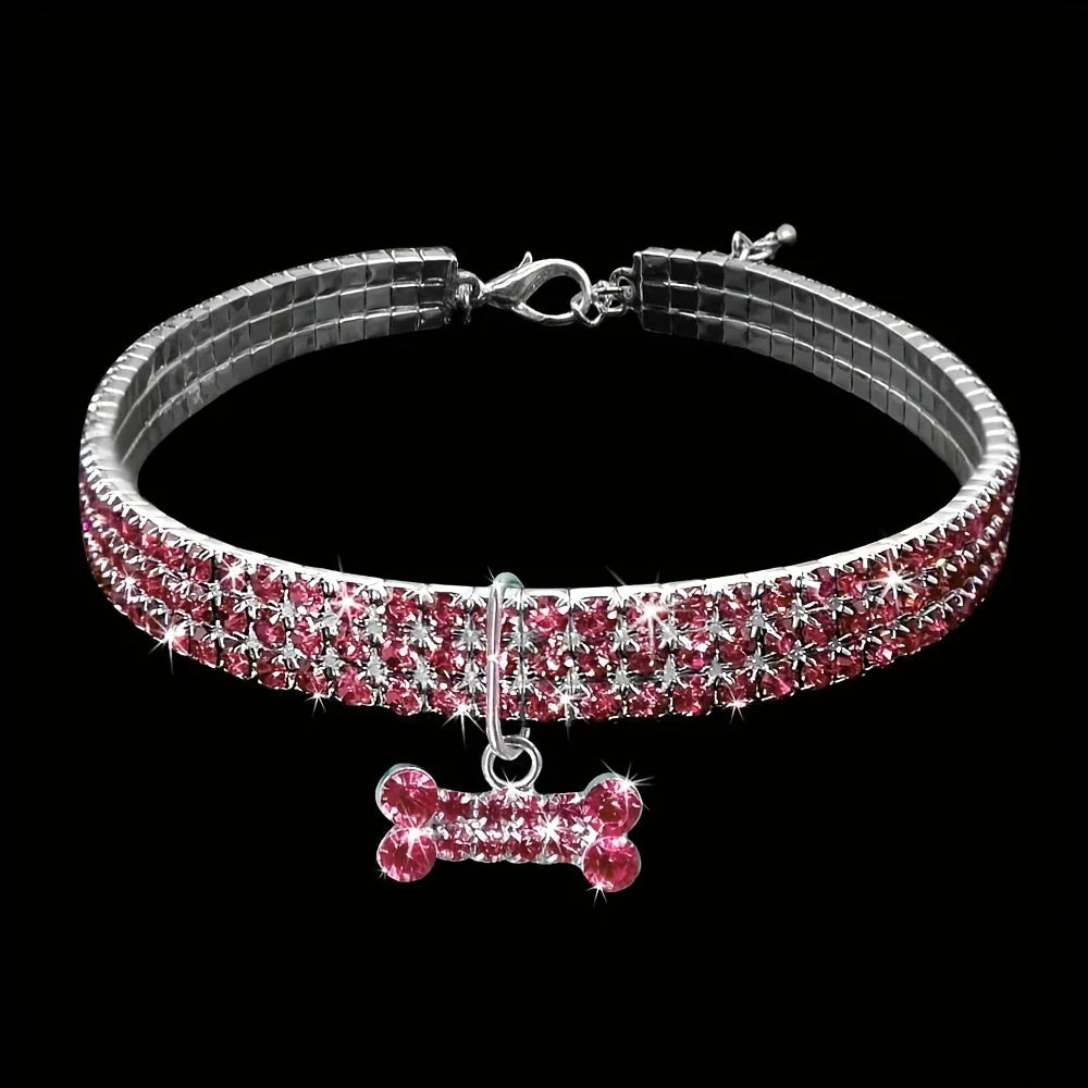 A silver jeweled bowknot pet collar for small dogs and cats with a decorative bow charm.