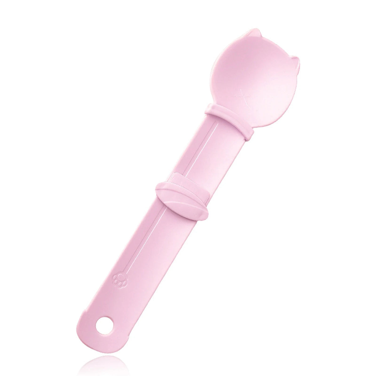 A pink squeeze spoon feeder for liquid cat treats with a rounded spoon tip and handle.