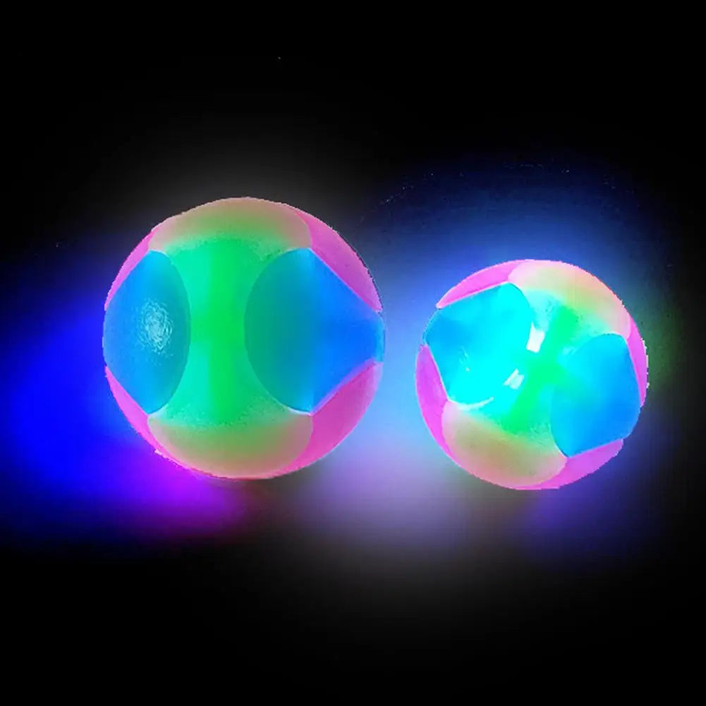An interactive glowing fetch ball for pets, showing vibrant green and blue light.